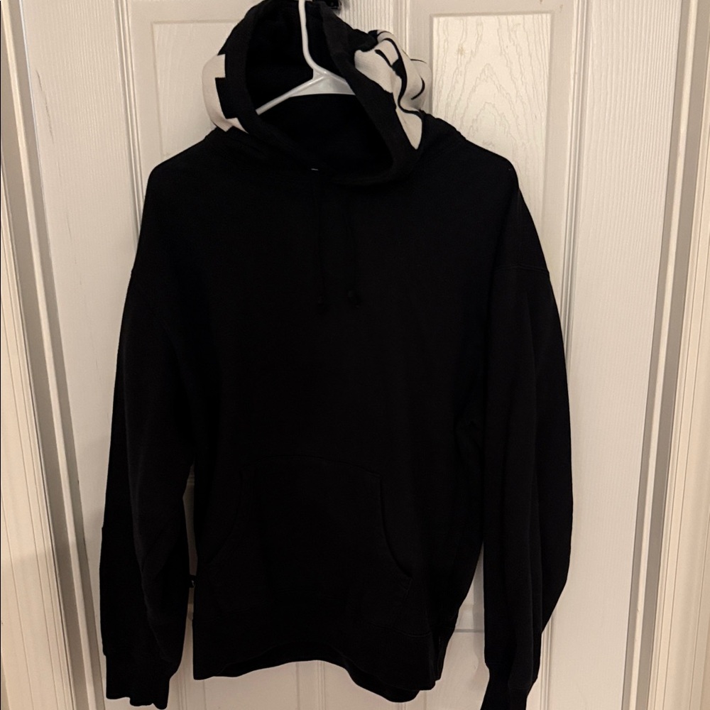 Supreme Black Hoodie with White Accents